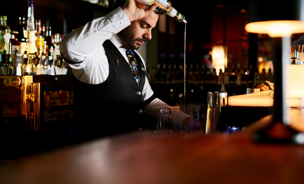 Bartender preparing a cocktail at the DaCaio bar
