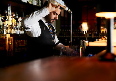 Bartender preparing a cocktail at the DaCaio bar