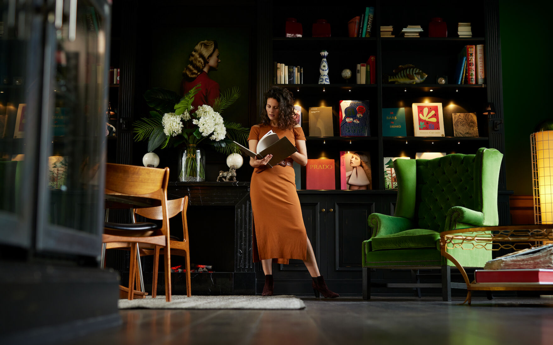 Woman reading in the Private Library at The George