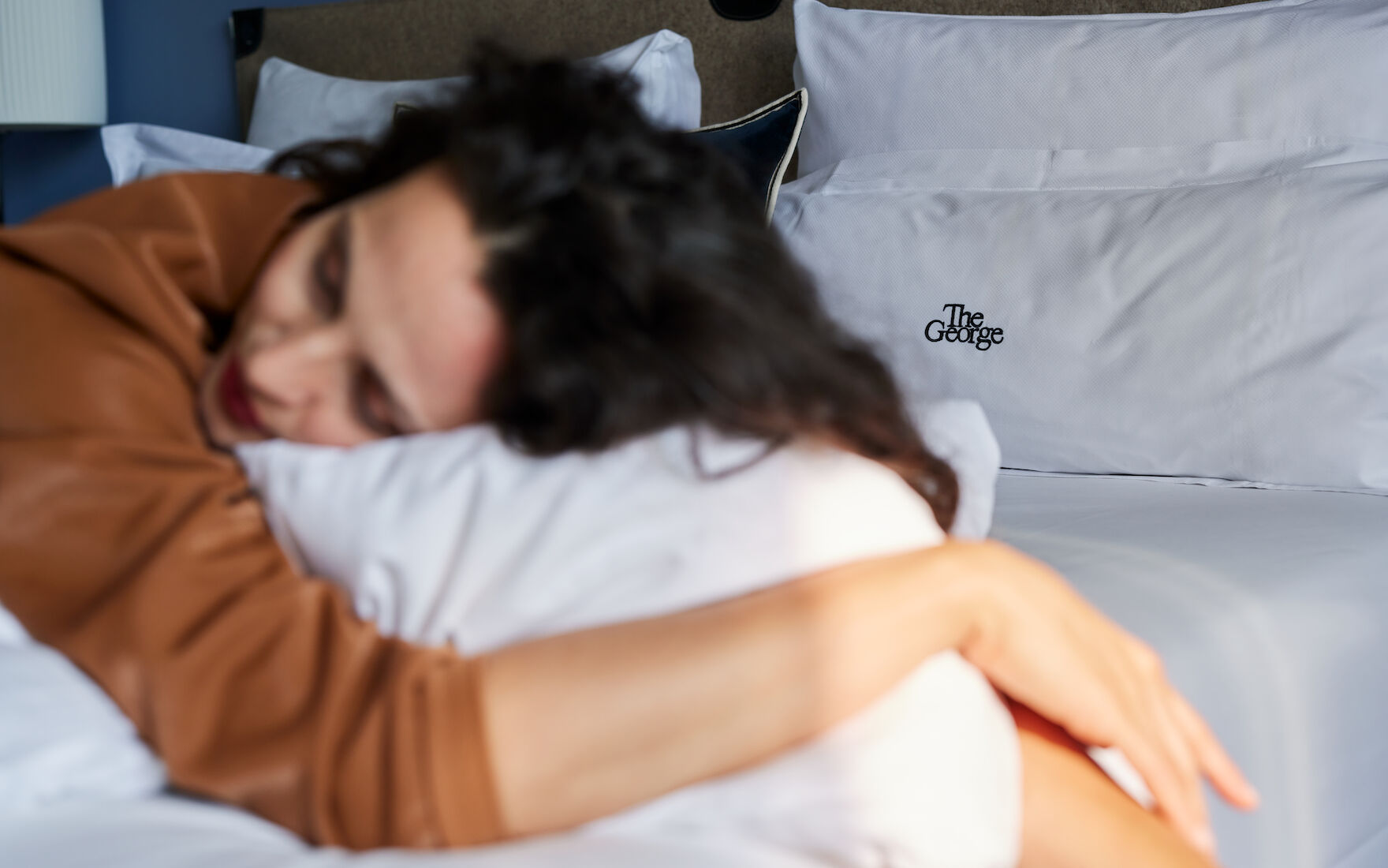 Woman sleeps peacefully in the M-Room at The George Hotel