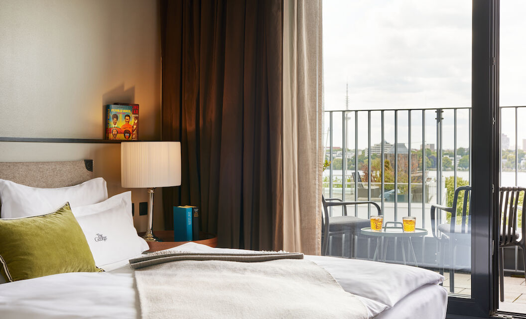 The George Hotel Hamburg Zimmer Sa Room 02 Double bed in foreground, window view outside towards the Alster